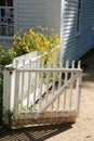 Quaint white fence at colonial house Royalty Free Stock Photo