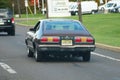 Quakertown, Pennsylvania, U.S.A - October 22, 2023 - A brown color of 1977 Ford Mustang on the road