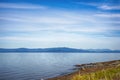 Qualicum beach in Vancouver Island, with the Canadian Rockies in