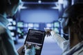 Experts code on tablet in data center
