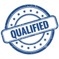 QUALIFIED text on blue grungy round rubber stamp