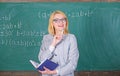 Qualities that make good teacher. Woman teaching near chalkboard. Principles can make teaching effective and efficient Royalty Free Stock Photo