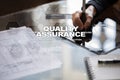 Quality assurance concept on the virtual screen. Business concept. Royalty Free Stock Photo