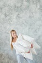 Quality bedding sound sleep woman hold pillows