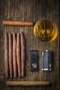 quality cigars with cognac, lighter and cutter