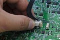 Quality control and assembly of SMT printed components on circuit board Royalty Free Stock Photo