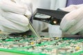 Quality control of electronic components on PCB Royalty Free Stock Photo