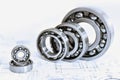 Quality control in modern mechanical engineering - technical drawing and ball bearings on white background Royalty Free Stock Photo