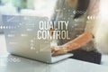 Quality control with woman using laptop Royalty Free Stock Photo