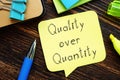 Quality over quantity is shown on the photo using the text Royalty Free Stock Photo