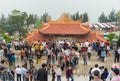 Quang Ninh, Vietnam - Mar 22, 2015: Crowded people visit Giac Tam zen monastery, Cau Bau pagoda in festive days