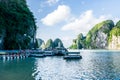 Quang Ninh, Vietnam, October 14, 2018: View of Halong Bay Cruise ship parking at t Sung Sot Cave or Surprise Cave of Ha Long Bay