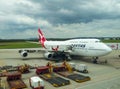 Quantas airplane on the tarmac at the airport under cloudy sky in Brisbane Queensland Australia 11 23 2013