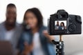 Quarantine Blog. Happy African American Couple Recording Video At Home Royalty Free Stock Photo