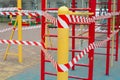 Quarantine Covid-19. Playground is blocked by red warning tape. Stay home Royalty Free Stock Photo