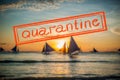 Quarantine due to coronavirus epidemic covid19 Sailboats at sunset, Boracay Island Royalty Free Stock Photo