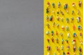 Quarantine and social distancing concept during COVID-19 pandemic. Crowdly people isolated on yellow background facing an empty Royalty Free Stock Photo