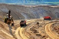 Quarry excavator loading sand or into dump truck at opencast Royalty Free Stock Photo