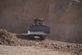 Quarry Mining movers excavators working on breaking the rocks Royalty Free Stock Photo