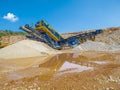 Limestone Stone Quary and an excavator. Royalty Free Stock Photo