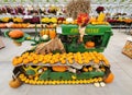 Quarryville, Pennsylvania, U.S.A - October 19,2023 - A John Deer garden tractor decorated with small pumpkins