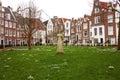 The quarter of the Beguines of Amstedam. Beguinage in the secret garden of the Beguines in Amsterdam on a winter day