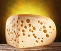 Quarter of Emmental cheese head.