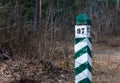 Quarter pillar in the forest. A pillar for a landmark in the forest. Royalty Free Stock Photo