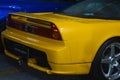 Quarter rear of yellow Honda NSX or Acura NSX in North America