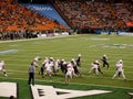 Quarterback gives ball to runningback