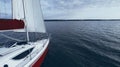 Quarterdeck sailing or yacht race on calm water summer evening. Regatta