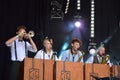 Quartet of horn-blowers performing at festival copacobana Royalty Free Stock Photo