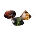 Quartz citrine and two tourmalines. Perfect dazzling faceted gems. Luxury jewels Royalty Free Stock Photo