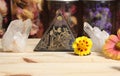 Quartz Crystals and Stone Pyramid With Flower. Relaxation and Meditation Decor