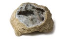 A quartz geode stone placed on the white background.