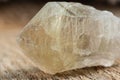 Quartz with Rutile Crystal Mineral Stone on Wood Royalty Free Stock Photo