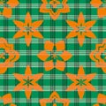 Quatrefoil stars or flowers seamless vector pattern background. Historical inspired orange foil motifs on gingham tartan Royalty Free Stock Photo