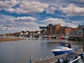 The quay and harbour of Wells-next-the-Sea in North Norfolk, UK. The Granary Building appears left of centre