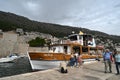 Quay of the old port of Dubrovnik with tourists Royalty Free Stock Photo