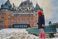Quebec, Canada, April 16, 2019: Quebec city travel little girl walking on Promenade Terrasse Dufferin visiting old town