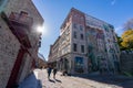 Fresco Wall Art in the Quebec City Old Town in autumn sunny day. Mural of Quebecers.