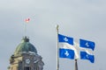 Quebec and Canadian flags in Quebec City, QC, Canada Royalty Free Stock Photo