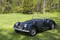 Classic 60s Morgan sports car painted in British Racing Green shown during the Rendez-vous British event