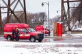 Two firemen from the nautical rescue unit getting back into their truck after a St. Lawrence River flash flood