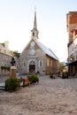 The 17th Century Place Royale, with the historic Notre-Dame-des-Victoires church and patrons at the CafÃ© Smith