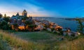 Quebec City skyline with Chateau Frontenac at sunset viewed from hill, nightsky