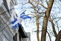 Quebec flag in Montreal billowing in the breeze Royalty Free Stock Photo