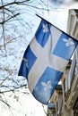 Quebec flag in Montreal billowing in the breeze Royalty Free Stock Photo