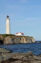 Quebec, the lighthouse of Cap les Rosiers in Gaspesie Royalty Free Stock Photo