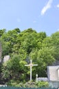 Quebec, 28th June: Library Pere Frederic courtyard Cross on Rue du Petit Champlain from Old Quebec City in Canada